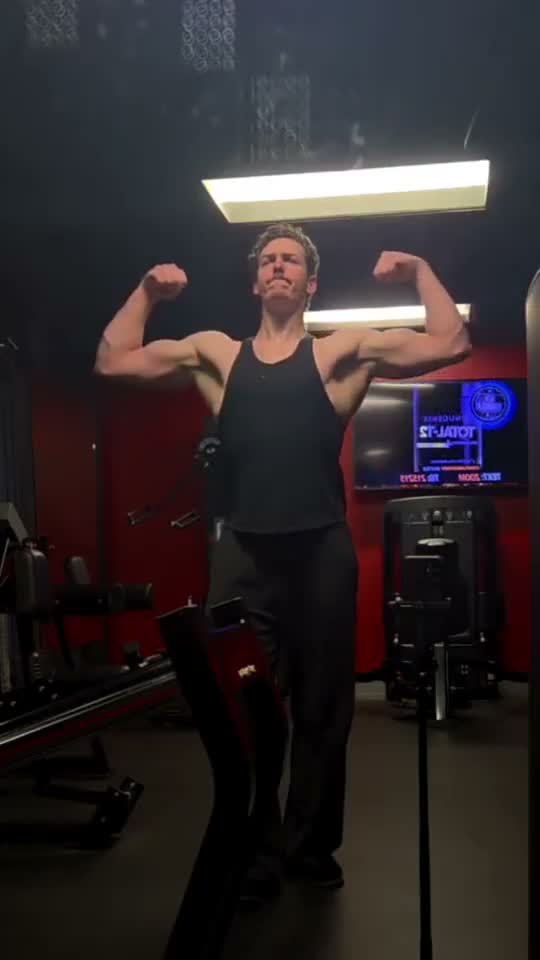Sam performing a front double biceps